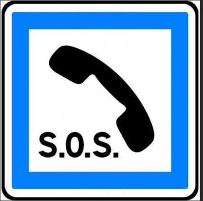 Panneau de signalisation indiquant un téléphone d’urgence.